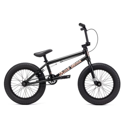 A Kink Carve 16 Inch Bike with thick tires, a straight horizontal bar, Mission parts, and orange lettering on the frame.