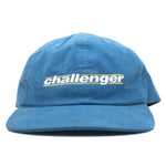 Limited quantities of the Challenger Corduroy Hat, featuring "Challenger" elegantly embroidered on its front in blue, embody the adventurous spirit of a BMX Challenger.