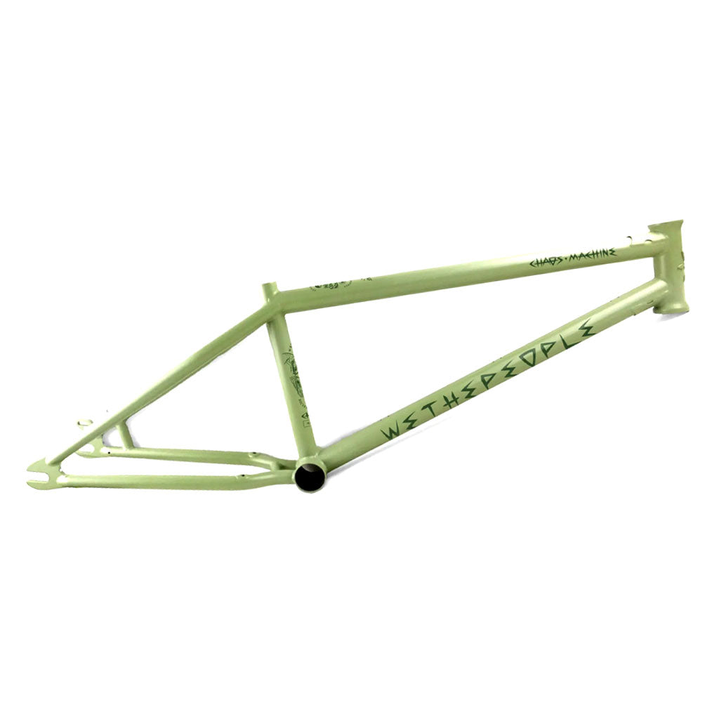 A green bicycle frame with the text "Wethepeople Chaos Machine 22 Frame (Tyson Jones-Peni Signature)" on the side is positioned on a white background, showcasing its trail geometry and structured components.