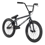 The Raven LC 20 Inch Bike is a black BMX model with a logo on its Cro-Mo frame, equipped with wide tires, handlebars, a padded seat, and alloy double wall rims.