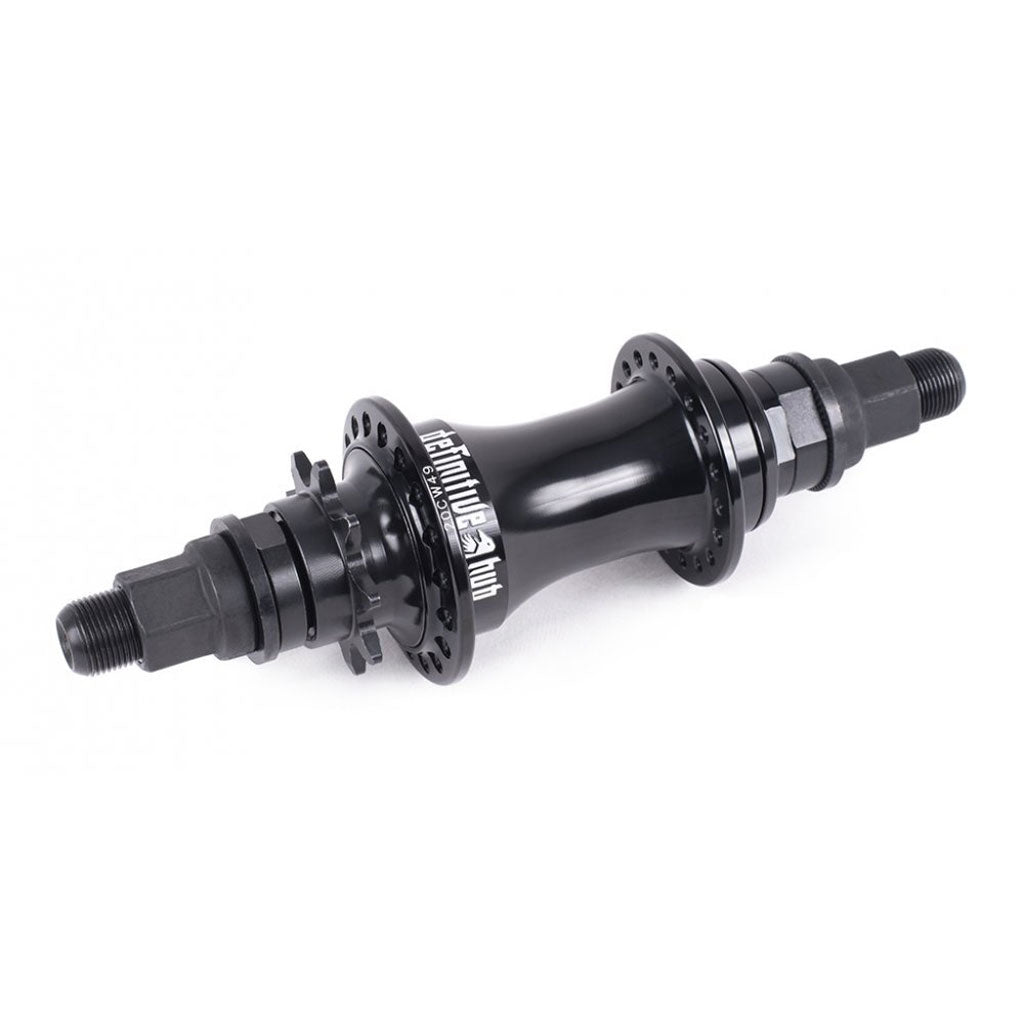 The Shadow Conspiracy Definitive Cassette Hub, made from CNC’d 6061-T6 alloy, features a sophisticated black design with various spoke holes and a high engagement driver on its threaded axles.