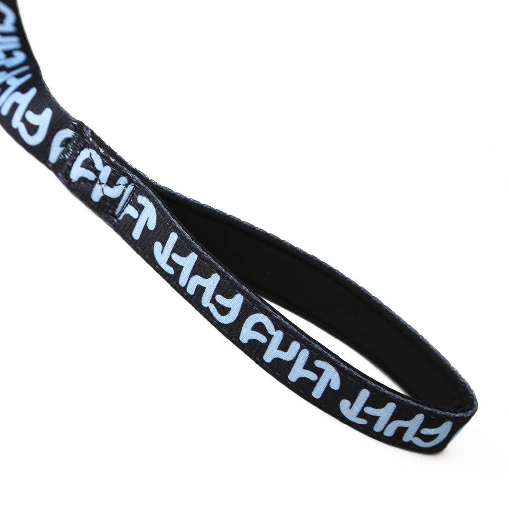 A Cult Dog Leash with a heavy-duty build and black lanyard featuring blue and white text design lies on a white background.