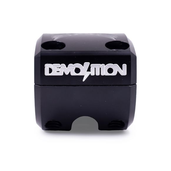 Black BMX Demolition Josh Dove Signature Stem with bold "Demolition" logo in crisp white text on the front, showcasing a sleek design.