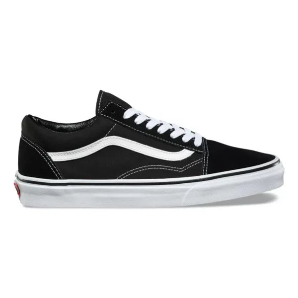 A sneaker reminiscent of the classic Vans Kids Old Skool Black/White, featuring a black and white color scheme with a white stripe, white laces, and a white rubber sole.