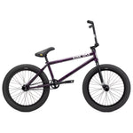 A Kink Downside 20 Inch BMX bike, featuring a purple frame with black handlebars, seat, and tires, positioned against a white background.