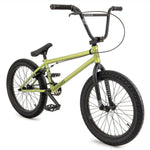 The Fly Bikes Electron 20 Inch Bike is a green BMX featuring black handlebars and wheels, built with a durable CrMo material frame. It boasts prominent branding on both the frame and fork and comes equipped with dependable Trebol Tires for better performance.