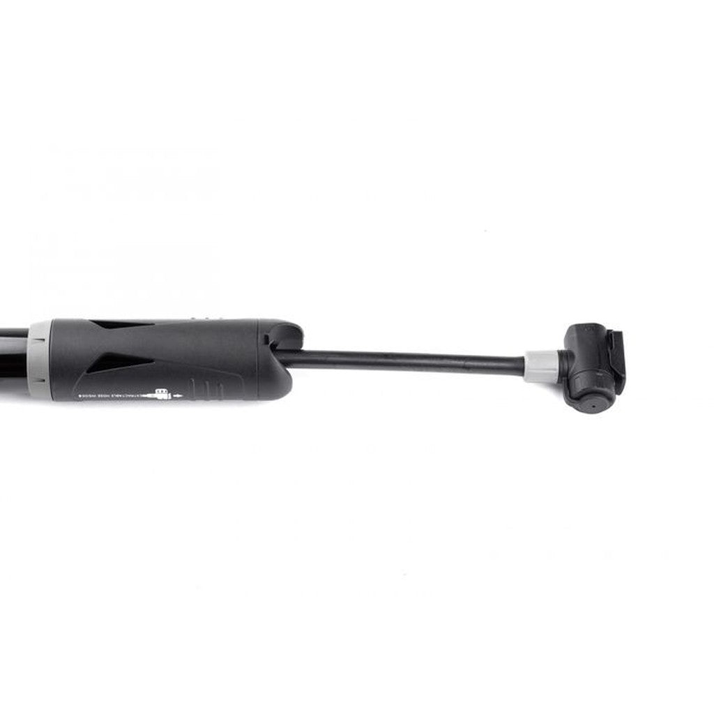 The Giyo Mini Hand Pump, a sleek black device constructed from durable alloy, is positioned against a white background. It comes equipped with a flexible hose and attached nozzle, effortlessly inflating up to 80 PSI.