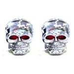 Enhance your car accessories with boldness using a pair of small silver Skull Valve Caps featuring red eyes, positioned side by side.