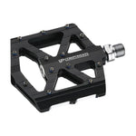 The VP Junior/Expert CNC Sealed Bearing Pedal, a black metal bicycle pedal branded with the "IP Components" logo, boasts a flat design and multiple grip pins.