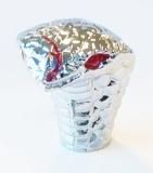 The product is a small, silver metallic Cobra Valve Cap with red details, resembling the shape of a cobra's hood and photographed against a plain white background.