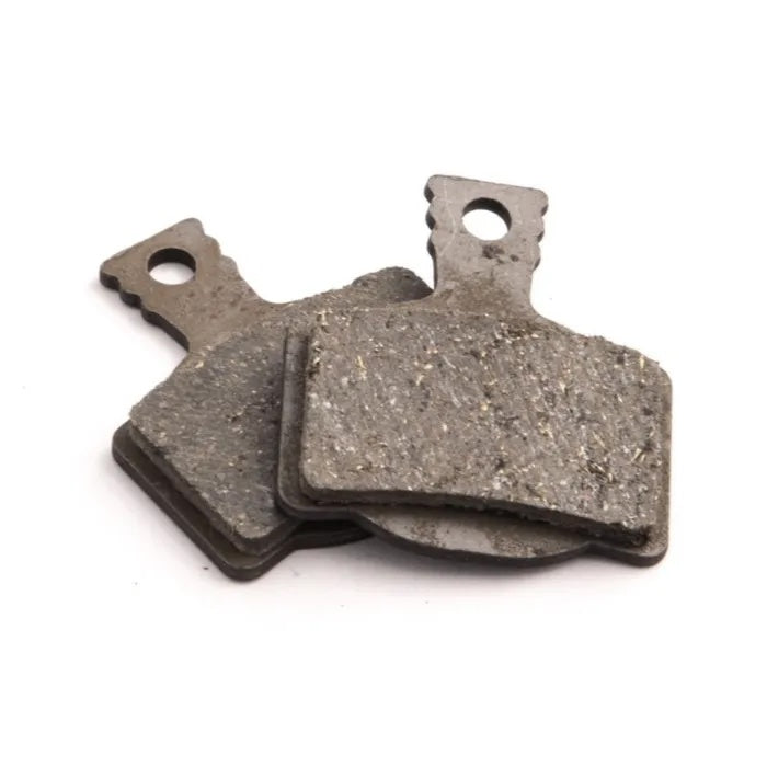 Two pre-owned Clarks VX Organic Disc Brake pads displayed on a white background, highlighting their superior braking performance.