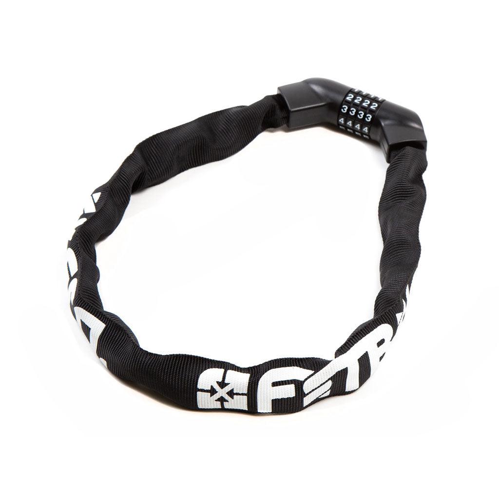 The Fit Resettable Chain Lock offers premium bike security with a black numerical code dial and a protective black fabric sleeve with white text, combining reliability and style perfect for cycling enthusiasts.