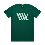 The LUXBMX Flag Tee Jade is a green heavyweight tee that features a striking large white graphic design with three overlapping "W" letters in the center.