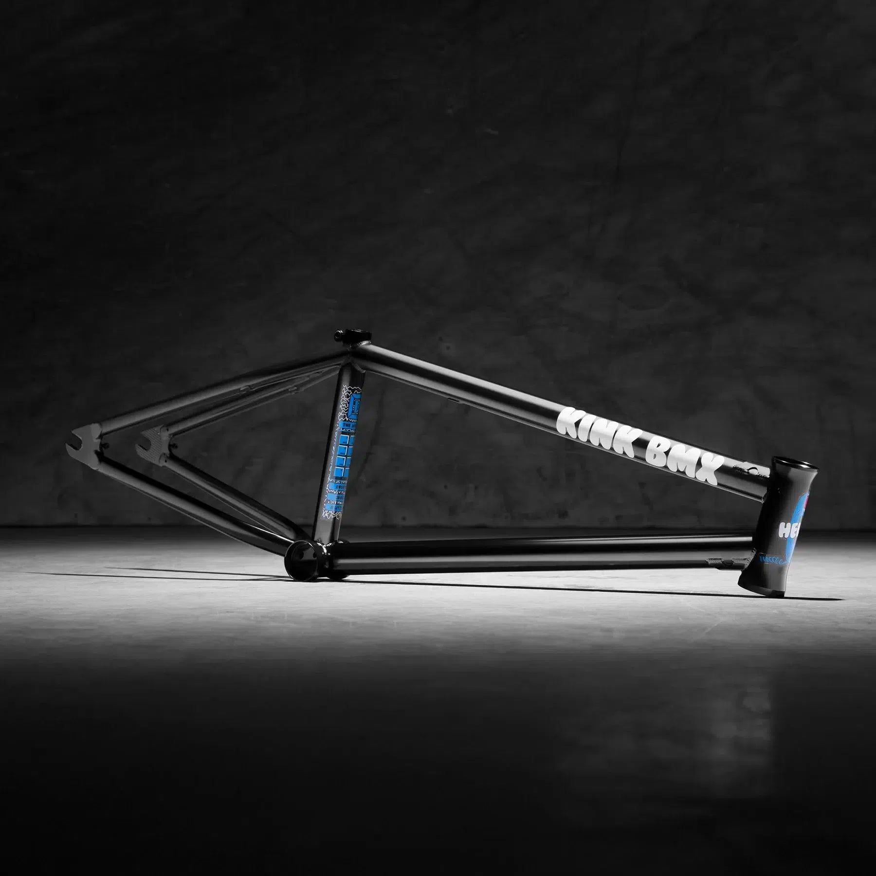 The Kink Williams Frame, inspired by Nathan Williams, features a sleek black design with vibrant blue accents, standing out against any background. It's both durable and aesthetically appealing for biking enthusiasts.