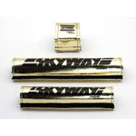 A set of gold and black SKYWAY USA Made Retro Pad Set tin cans, reminiscent of the 80's era.