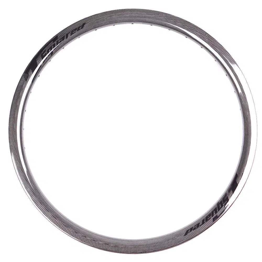 A Tsquared Carbon Rim / Front, 406 x 25mm in size, featuring a silver, circular design with several small evenly spaced holes around its non-braking surface.