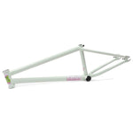 A white Fiend Morrow V4 Frame adorned with pink and green design details, presented from a side view against a white background. As the Ty Morrow signature frame, it features street-oriented geometry that makes it ideal for urban riders.