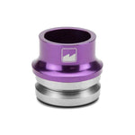 A Merritt High Top Headset, purple and silver, with a geometric logo gracefully etched on its cylindrical surface.