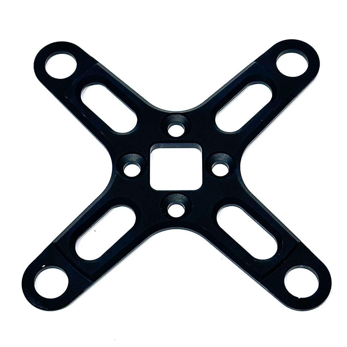 This CNC machined black metal X-shaped spider, featuring a central square hole and four round corner holes, is compatible with VSR M4 Mini Cranks. Product: Calculated VSR R Series Crank 4 Bolt Spider 104bcd.