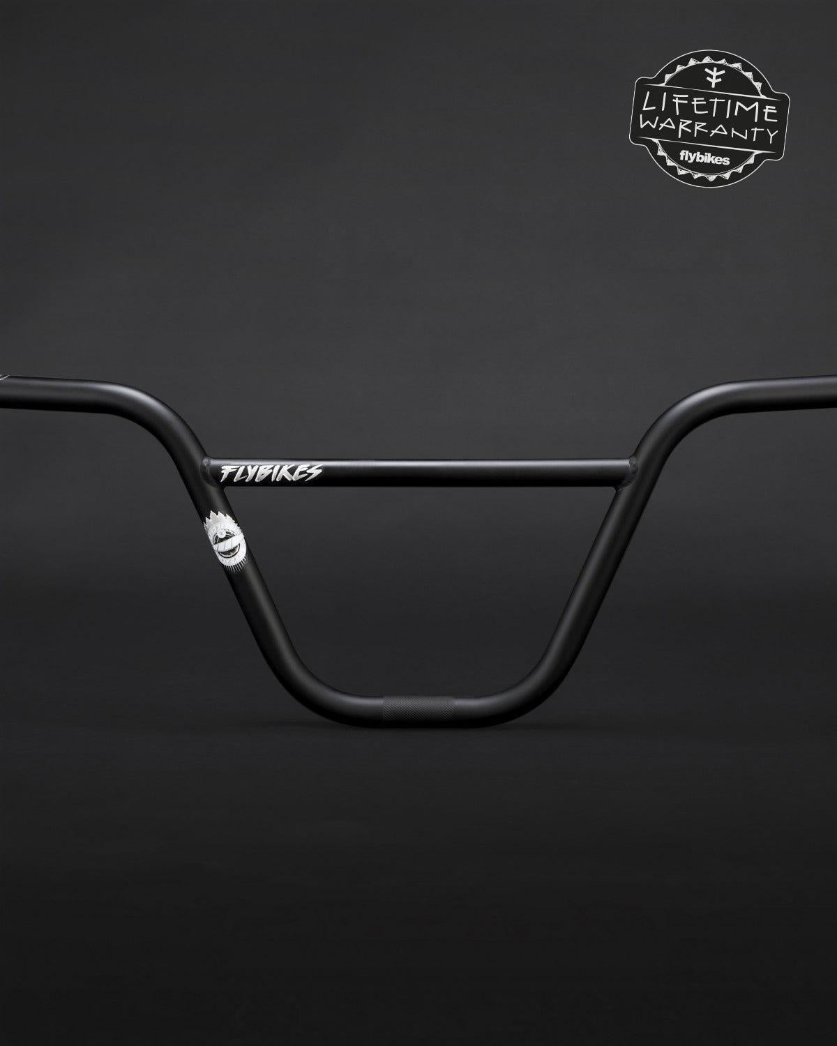 The Fly Bikes Sierra Bars are black BMX handlebars made from 4130 CrMo steel with multi-butted technology and a "Lifetime Warranty" badge on a dark background.