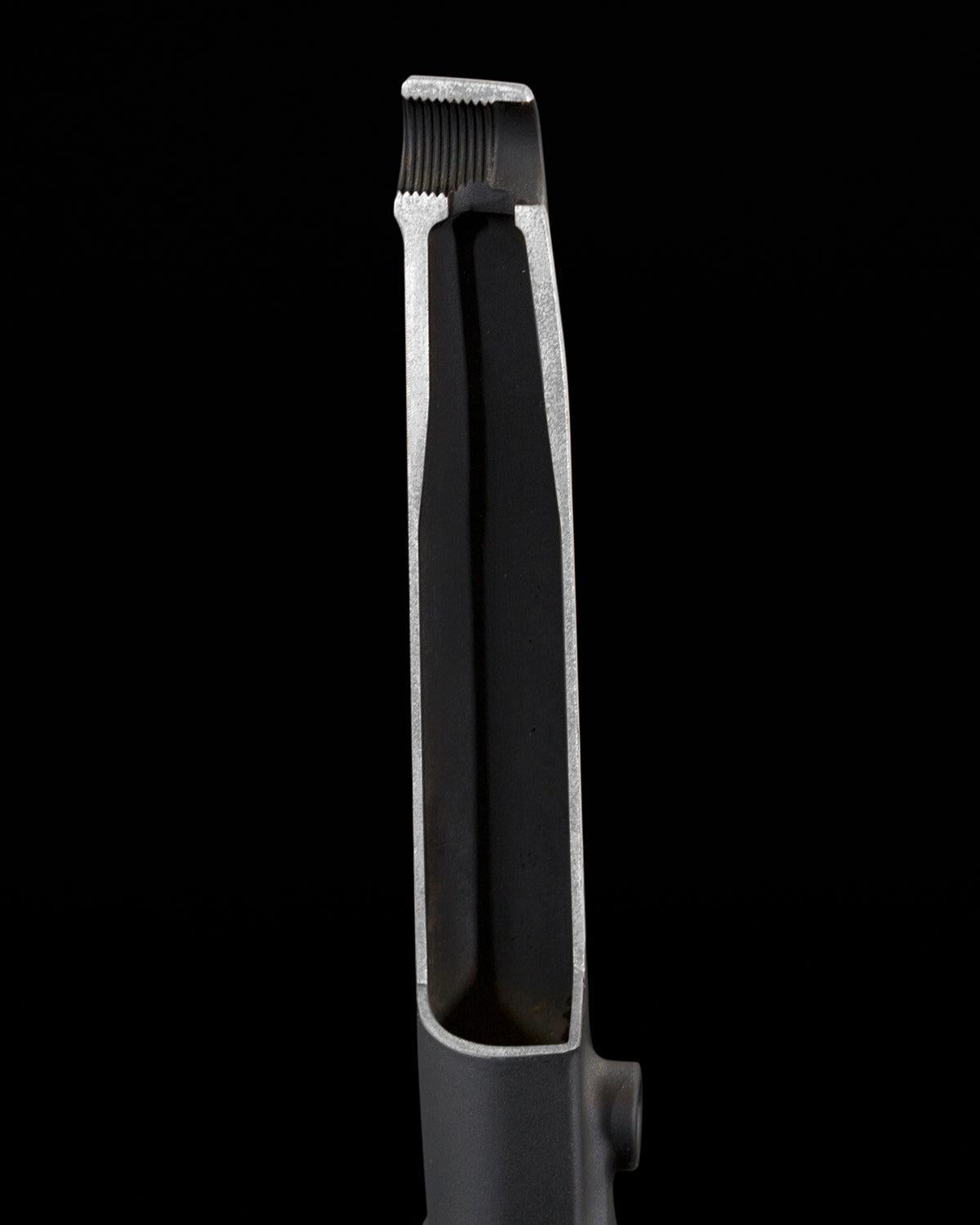 A cross-section of a 4130 Chromoly tubular metal object with a threaded end on a black background highlights the durability and precision of CNC Machining, similar to Fly Bikes Dolmen 24 Cranks.