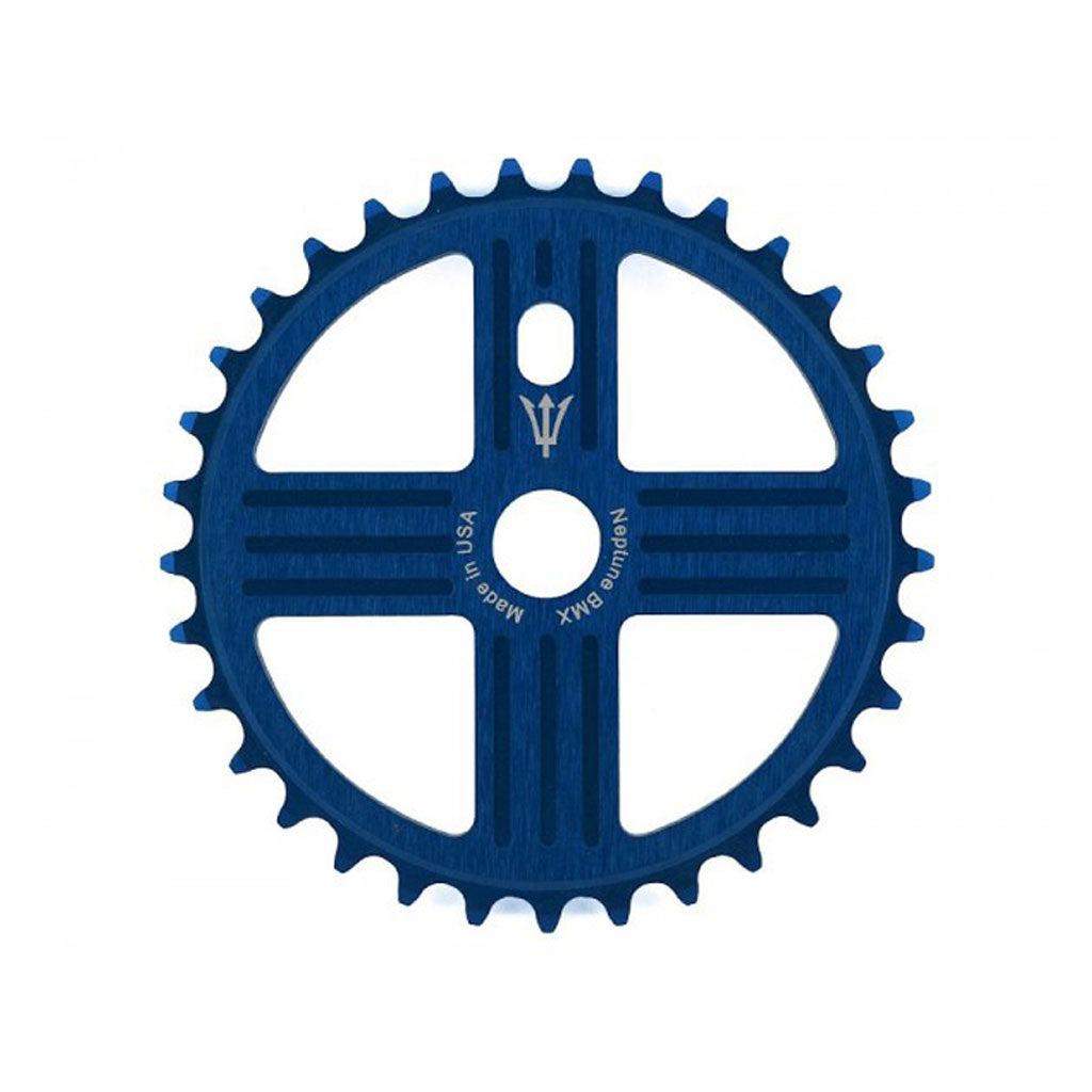 The MCS Neptune Helm Chainwheel is a blue bicycle chainring with 46 teeth. It features a central cutout and an additional four intersections for visual design, with the text reading "Neptune BMX, Made in USA.