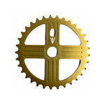 The MCS Neptune Helm Chainwheel features a gold-colored bicycle chainring with a cutout design, sporting 42 teeth and the inscription "Made in USA.