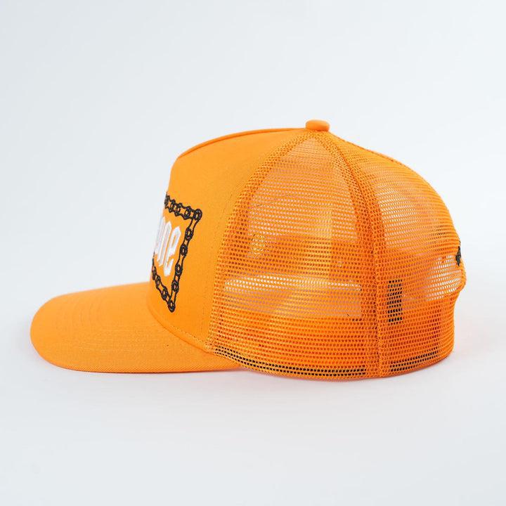 The Backbone No Weak Links Trucker Hat features an orange mesh design with a flat brim and a striking rectangular patch displaying a bold chain pattern on the side, making it a cornerstone of style.