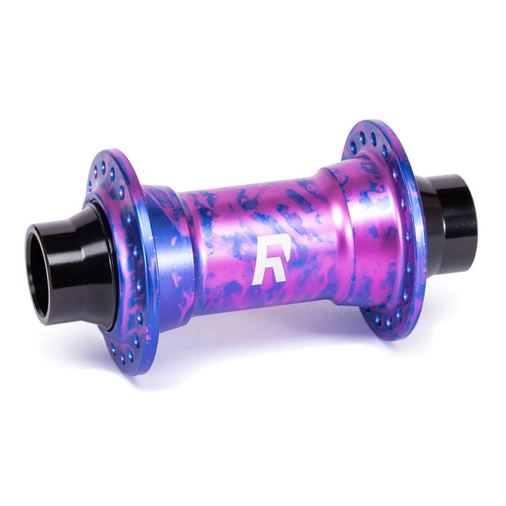 A vibrant purple and blue Radio Sonar Front Hub (32 Hole) designed for street and slopestyle riding, featuring thru axle compatibility, multiple spoke holes, and the letter "R" logo in white.