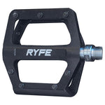 The Ryfe Rapscallion Sealed Pedals are black bicycle pedals with the brand name "RYFE" displayed in white letters. These pedals feature a flat, rectangular design with multiple grip pins and an alloy platform measuring 93mm x 96mm. They also include a sealed bearing for smooth performance.