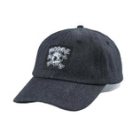 Black Backbone Real Deal 6 Panel Hat, low profile design with a skull logo patch and "BACKBONE" text on the front.