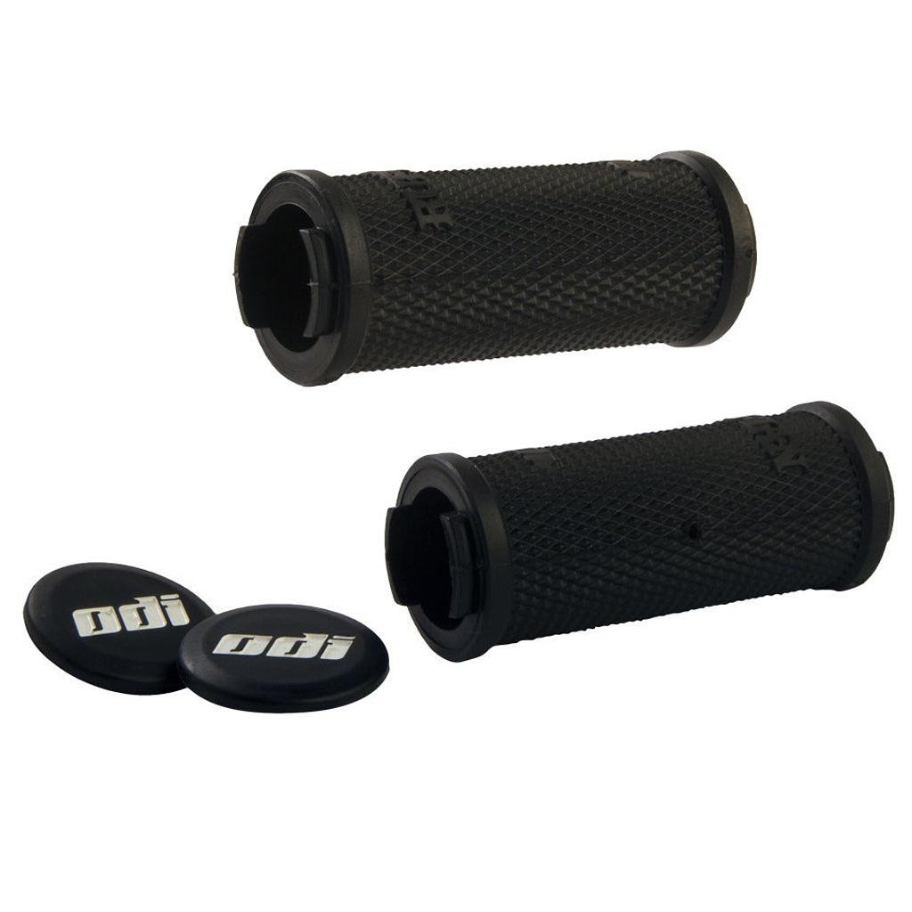 Two black ODI Lock-On Twist Shift Length grips with buttons, perfect for tiny hands on a balance bike.