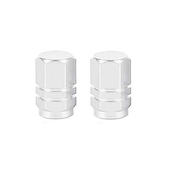 Hexagon Valve Caps (Pair): Two silver, hexagonal valve caps with a grooved middle section, placed side by side on a white background, add color and style to your ride.