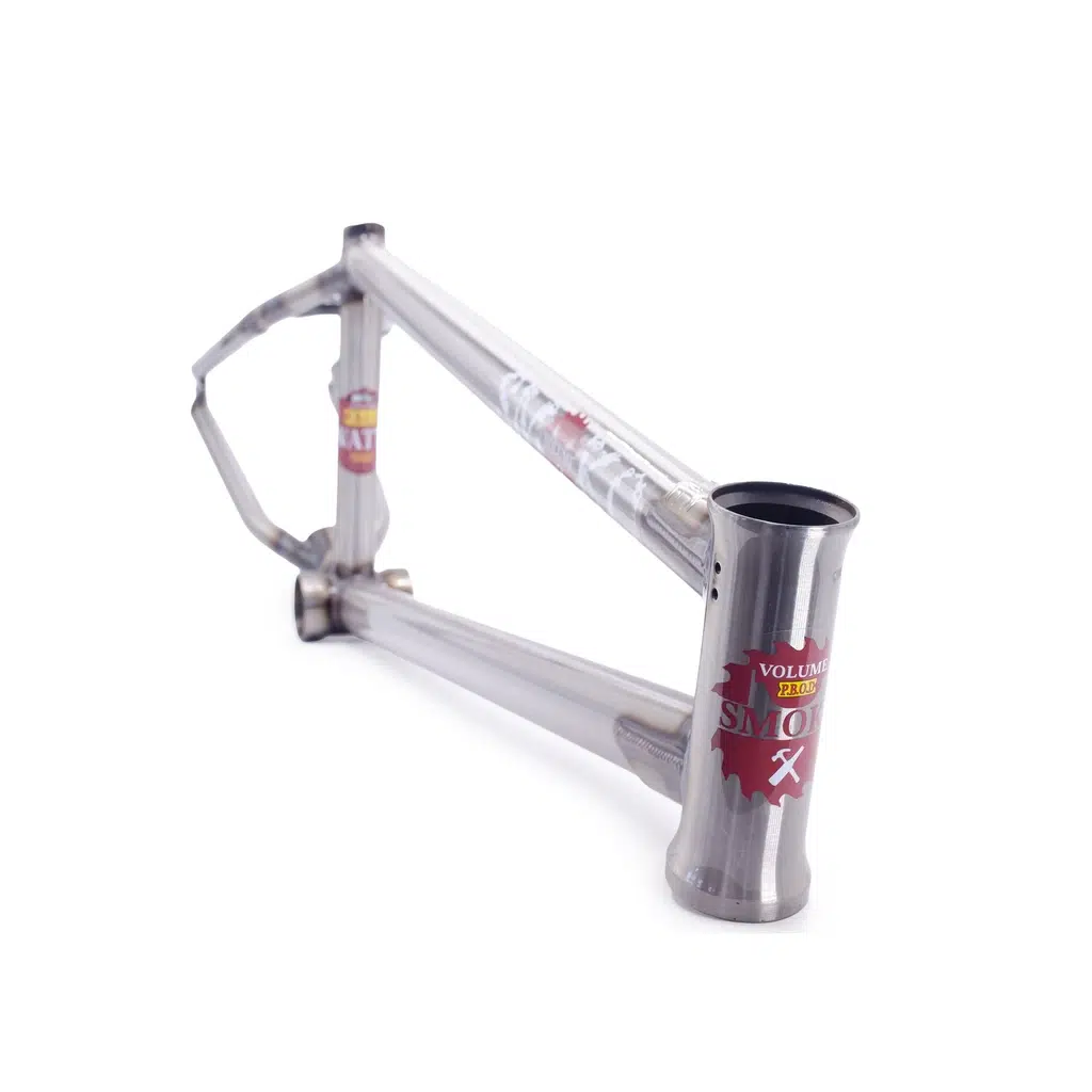 The Volume Jason Watts Smoko Frame, a chromoly bicycle masterpiece, features striking red and yellow decals elegantly set against a pristine white background.