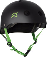 The S-One Helmet Lifer in Black Matte with Green Straps boasts a sleek design featuring ventilation holes, an adjustable chin strap, and is enhanced with EPS Fusion Foam for multiple impact protection, ensuring both safety and style.