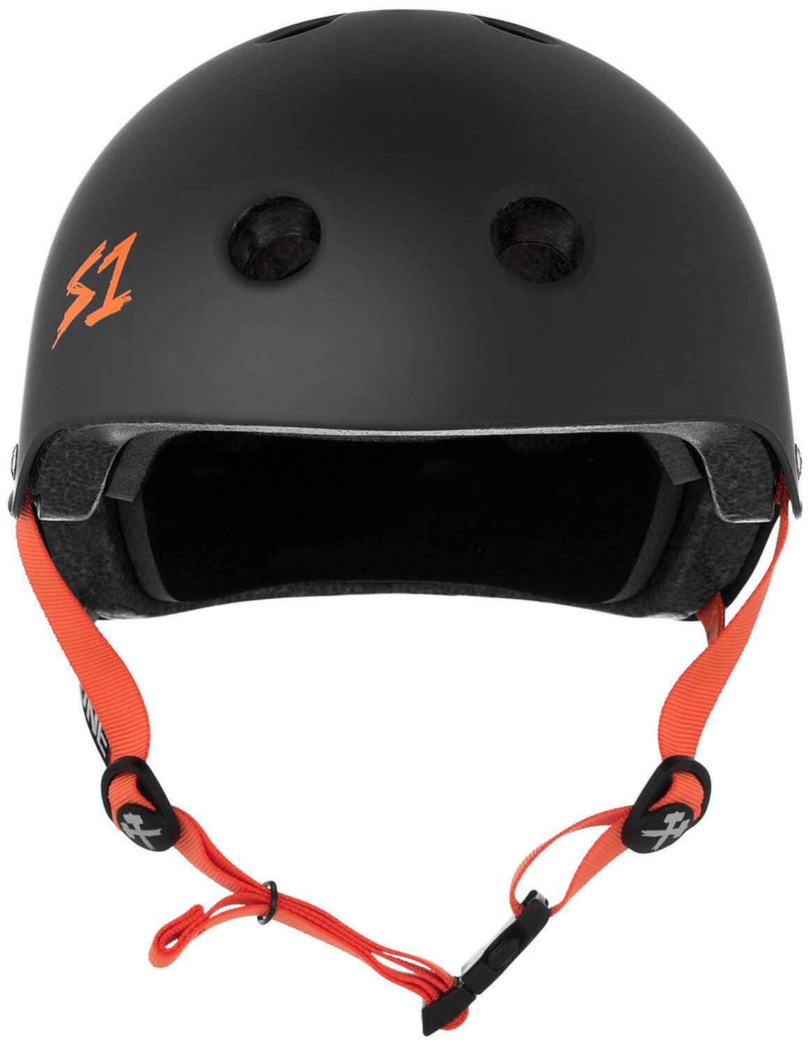 The S-One Helmet Lifer in Black Matte with Orange Straps is a stylish helmet that features multiple ventilation holes, an orange logo on the side, and offers enhanced safety with its EPS Fusion Foam, providing multiple impact protection for your ride.