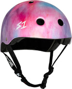 A pink and purple gradient S-One Helmet Lifer Cotton Candy with a white "S1" logo, featuring air vents and an adjustable black chin strap. This multi-impact helmet combines style and safety for any skateboarding adventure.