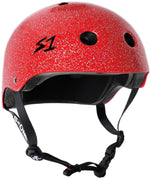 A red speckled S-One Helmet Lifer Red Glitter with a black interior, ventilation holes, and adjustable black straps. The helmet features an "S1" logo on the side and is designed to be a high-impact helmet for ultimate protection.