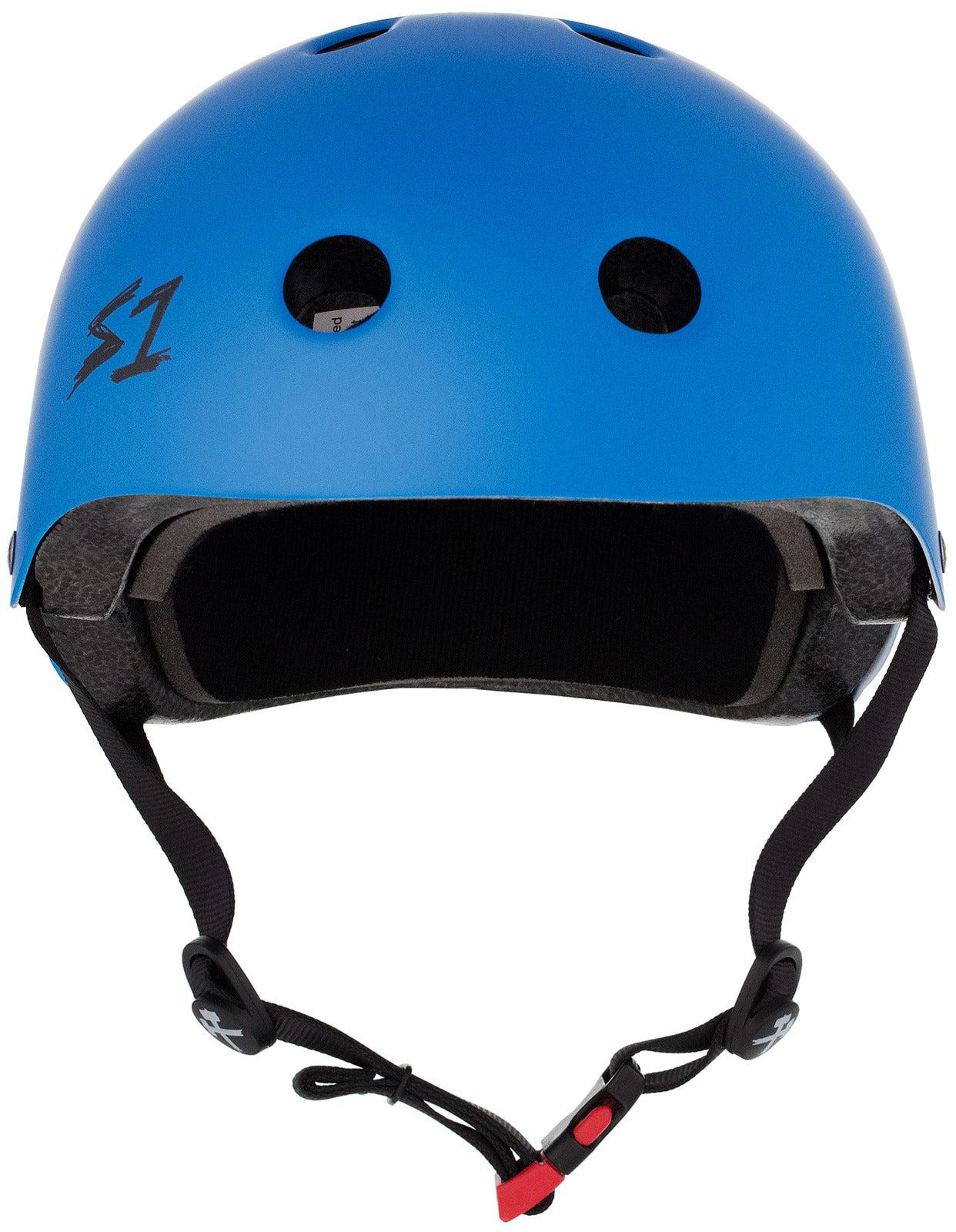 A S-One Helmet Mini Lifer Cyan Matte with black straps, two ventilation holes on the front, and the number "1" logo on the side. Equipped with EPS Fusion Foam for extra protection, this multi-impact helmet is built to keep you safe.