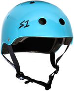 A blue S-One Helmet Mini Lifer Light Blue Metallic Gloss with black ventilation holes, gray padding inside, and an adjustable black chin strap features advanced EPS Fusion Foam for superior comfort and protection.