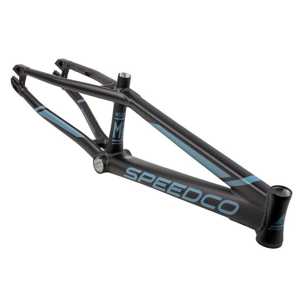 A black and blue Speedco 2024 M2 Pro L Frame is shown against a white background, featuring sleek internal cable routing.