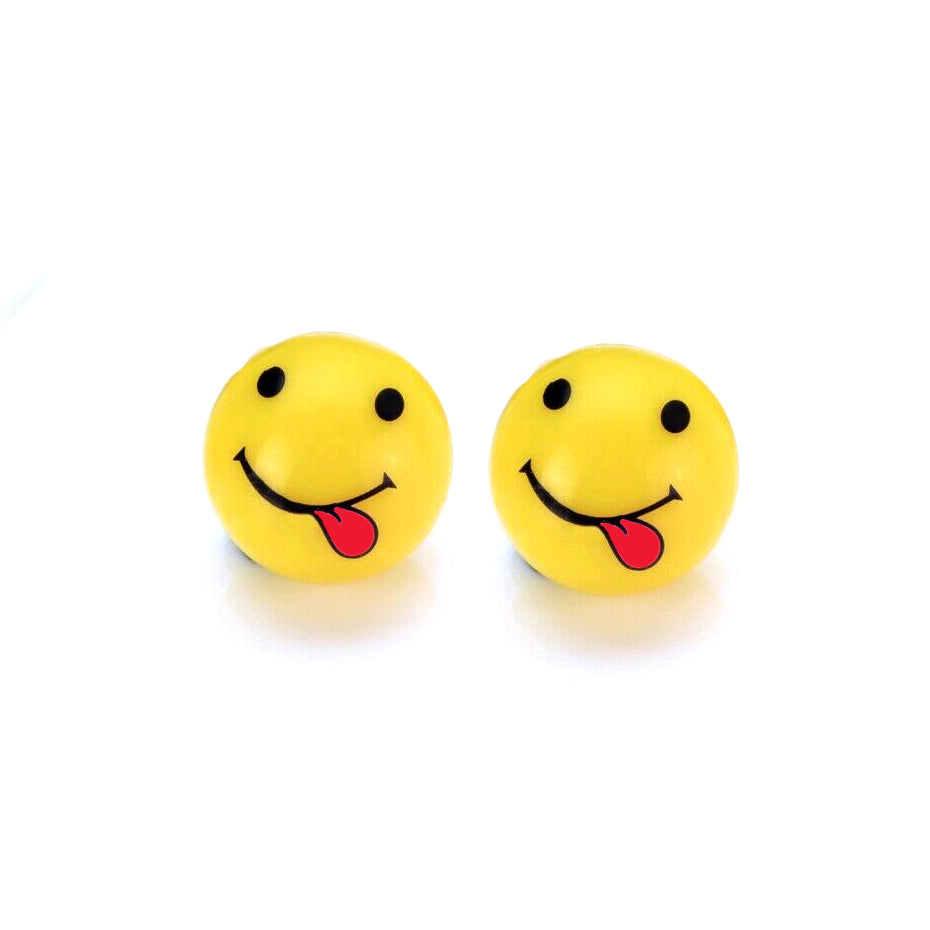 The Smiley Tongue Valve Caps (Pair) feature two yellow smiley faces with black eyes and red tongues, embodying the fun of an exhilarating BMX ride on a sunny day.